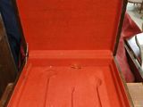 an open suitcase sitting on a table in a room