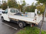 a white truck that is parked in the parking lot