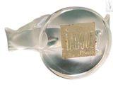 a close up of a glass object with a label on it