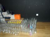 a lot of empty water bottles on the floor