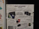 a box with a game inside of it on a black surface