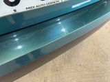a close up of a car ' s license plate on the back of a car