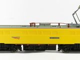a yellow train on the tracks on a white background