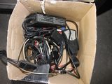 a cardboard box with a bunch of wires inside of it
