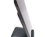 a close up of a cell phone on a stand