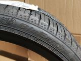 the tire of a motorcycle is shown with a box of boxes in the background