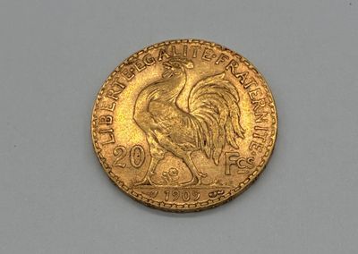 an image of a gold coin with a rooster on it