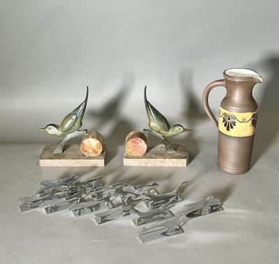 a lot of birds that are sitting next to a vase