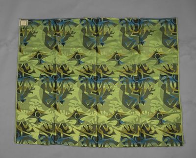 an image of a green and blue floral pattern on a gray background
