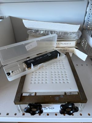 a box that has a remote on top of it