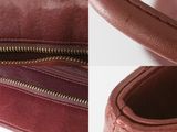 the inside of a purse with a zipper on the inside of it