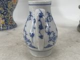 three vases that are sitting on a table