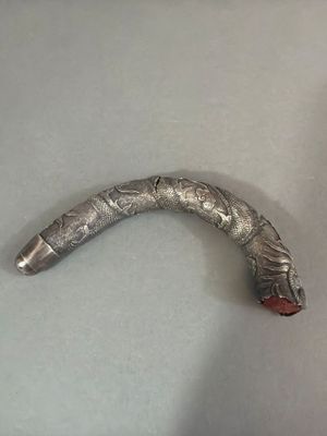 a metal object that is laying on a table