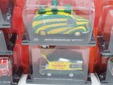 a lot of toy cars that are on display in a store