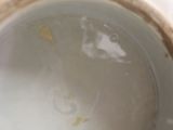 a close up view of a cup with water in it