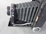 an old camera that is sitting on a table