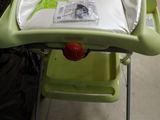 a baby high chair with a tray on top of it