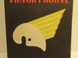 Le livre de Victor Prouve, *L'aigle en vol*, est exposé au musée.
