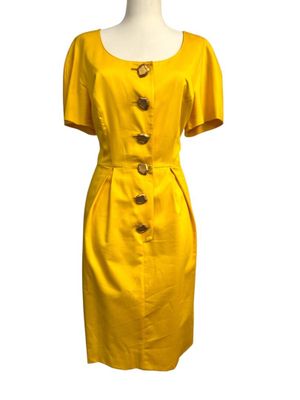 a yellow dress on a mannequin mannequin mannequin mannequin mannequin mannequin mannequin mannequin mannequin