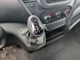 a close up of a car dashboard with a gear stick