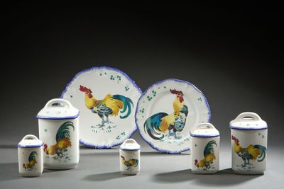 five pieces of pottery with roosters painted on them