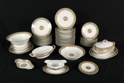 a picture of a table setting with a lot of plates and saucers