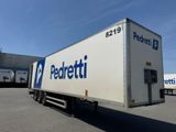 a semi truck that is parked in a parking lot