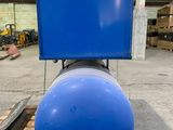 an image of a large blue ball sitting on top of a pallet