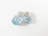 an image of a pair of blue topaze and white topaze earrings