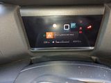 a car dashboard with a digital display on it