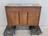 a wooden cabinet with a marble top on wheels