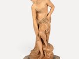 an image of a statue of a man holding a woman ' s hand