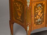 a marble top cabinet with two drawers and a marble top top