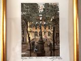 framed picture of a painting of a horse drawn carriage in front of a building