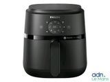 the philips air fryer is black and has a timer on it