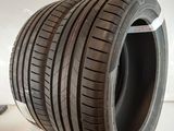 an image of a car tire on display in a showroom