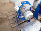 a blue and white blower sitting on a pallet
