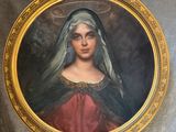 an oil painting of a woman with a veil on her head