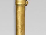 a gold object that is sitting on a table