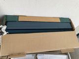 a cardboard box with a bunch of books on top of it