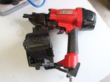 an image of a cord nailer on a table