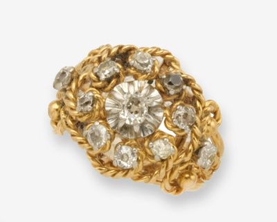 une image d'une broche en or et diamants