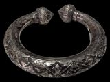 an image of a silver bracelet with skulls and skulls on it