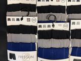 many pairs of men ' s socks on display in a store