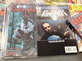a lot of comic books sitting on a table