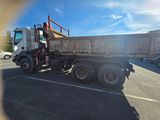 a dump truck that is parked in a parking lot