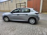 a picture of a silver car parked in a parking lot