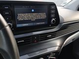 a picture of a car dashboard with a screen showing information