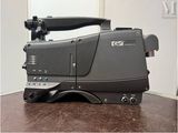 a video camera sitting on a table in a room
