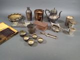 a lot of silver items that are on the table